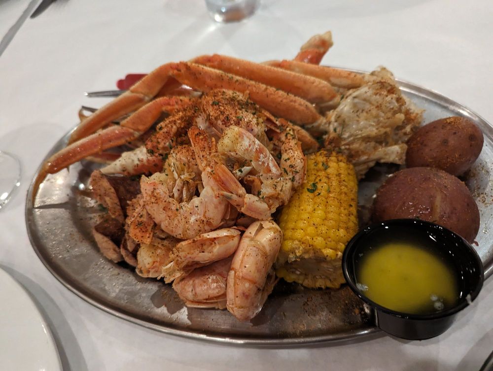 Poppy's Seafood Factory Logo