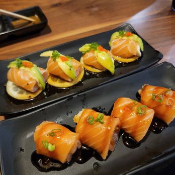 Kan Sushi - Salmon to the Moon (4 Pieces; Top) Roly Poly (4 Pieces; Bottom) - Sushi Bars Near Me - Honolulu, Hawaii Kan Sushi - Salmon to the Moon (4 Pieces; Top) Roly Poly (4 Pieces; Bottom) - Sushi Bars Near Me - Honolulu, Hawaii