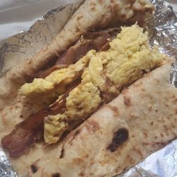 Mi Ranchito Restaurant - Bean egg and 2 strips of bacon.