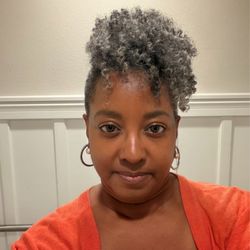After shot leaving salon. They charged $211 for a 2-strand twist out that didn't last