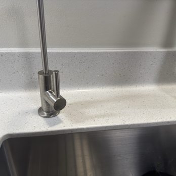 Signature Surfaces - Seamless backsplash behind kitchen sink - Kitchen & Bath Near Me - Sacramento, California