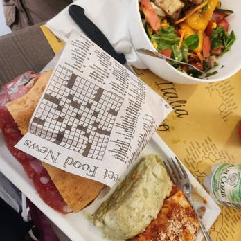 Pitti Express - Mixed salad, Primavera on focaccia bread, and shared half ragu lasagna  and half pesto lasagna - Sandwiches Near Me - Florence, FI