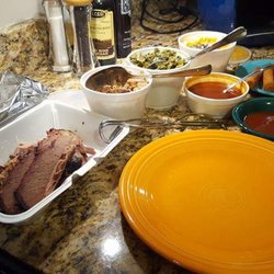 Adams Roadside BBQ - Family pack, 1-lb brisket, 1-lb pork BBQ, collards, spicy Mac-n-cheese, spicy sweet sauce.