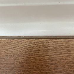 Basham Construction - It's hard to tell but the floor doesn't even go to the baseboard!