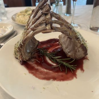 Bass Street Chop House - Rack of lamb with a red wine reduction - Steakhouses Near Me - Moline, Illinois Bass Street Chop House - Rack of lamb with a red wine reduction - Steakhouses Near Me - Moline, Illinois