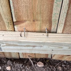 Action Fence of Chattanooga - Bottom of board not secured