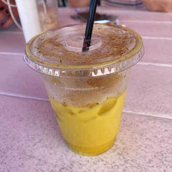 Drift Coffee and Kitchen - Iced golden latte. Super good and refreshing if you like ginger & turmeric! - Coffee & Tea Near Me - Ocean Isle Beach, North Carolina Drift Coffee and Kitchen - Iced golden latte. Super good and refreshing if you like ginger & turmeric! - Coffee & Tea Near Me - Ocean Isle Beach, North Carolina