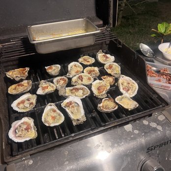 Fat Harry's - oysters being cooked on a grill - Bars Near Me - New Orleans, Louisiana