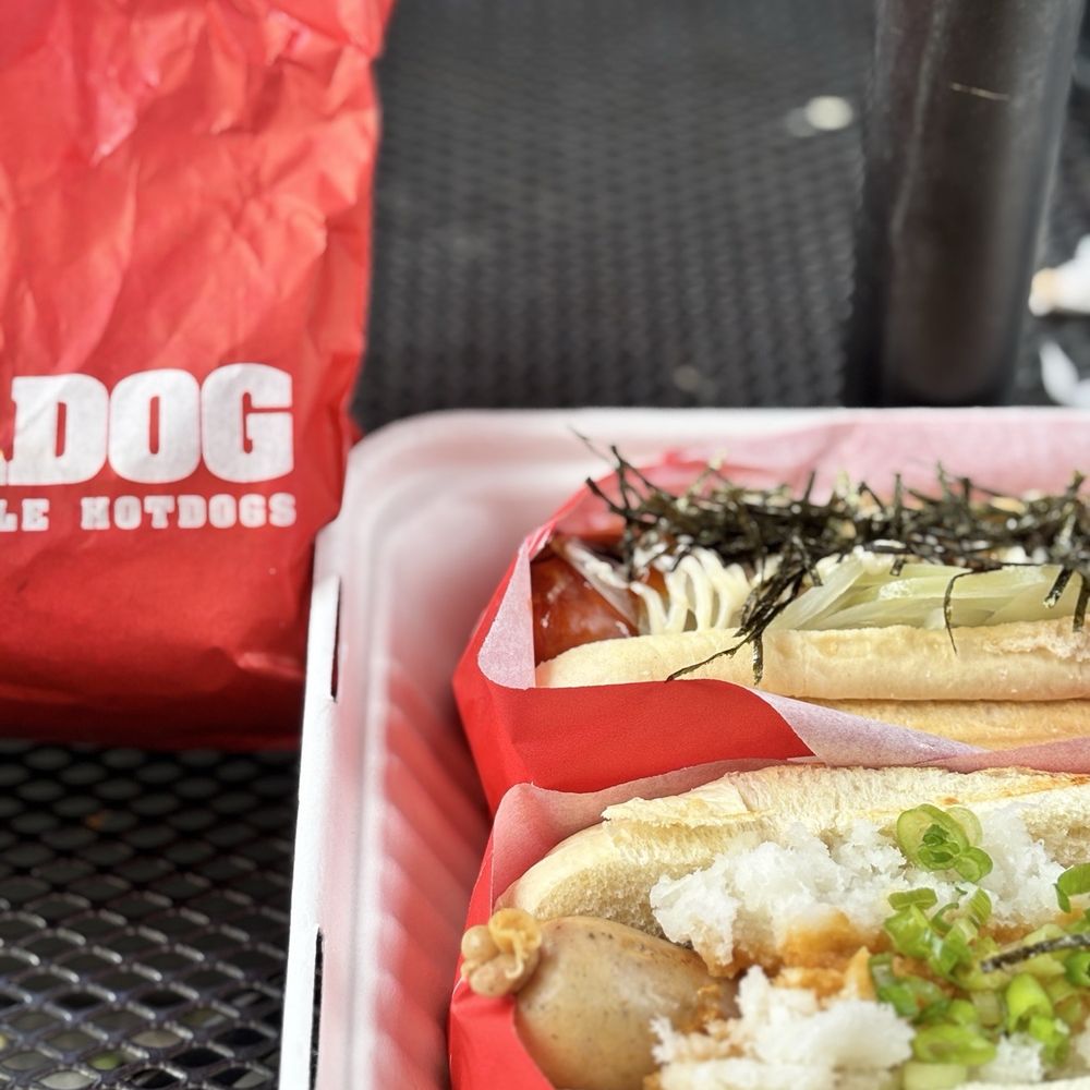 Japadog - Kurobuta Oroshi (front) All Beef Terimayo (back) Fries - Hot Dogs Near Me - Vancouver, British Columbia Japadog - Kurobuta Oroshi (front) All Beef Terimayo (back) Fries - Hot Dogs Near Me - Vancouver, British Columbia