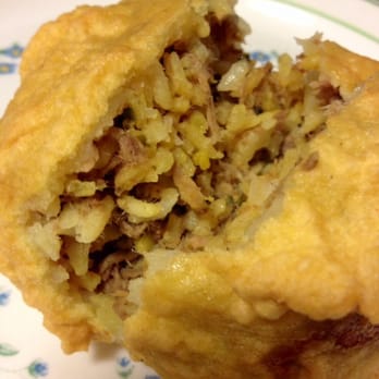 Colombia Bakery - Fried ball with rice and chicken and sauce inside. Perfection. Sells out quickly. - Bakeries Near Me - Hackensack, New Jersey