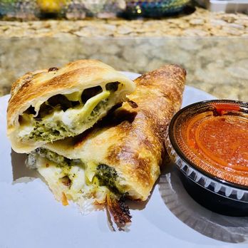 Brooklyn Pizza Co. - Broccoli Roll. So Good! The picture doesn't do it justice. It was huge! And stuffed with broccoli sautéed in olive oil and garlic. - Pizza Near Me - Wilmington, North Carolina Brooklyn Pizza Co. - Broccoli Roll. So Good! The picture doesn't do it justice. It was huge! And stuffed with broccoli sautéed in olive oil and garlic. - Pizza Near Me - Wilmington, North Carolina