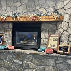 Rogers Jewelry Co - Festive fireplace with store's history