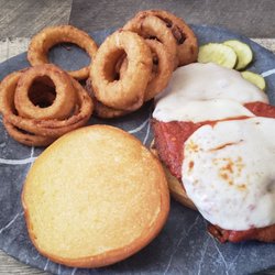 Orchard Tavern West - Chicken Parmagian sandwich with onion ring substituted for french fries with a nominal upcharge for the substitution