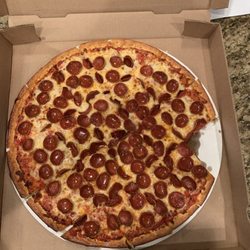 Mo's Place - This was petty good pizza! The crust was light and airy, the sauce was a light sweet sauce. I was over all pretty good!