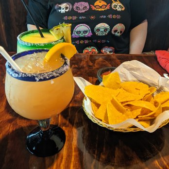EL MOLCAJETE - Frozen pineapple margarita (back) and watermelon margarita on the rocks (front) - Mexican Near Me - Madison, Alabama