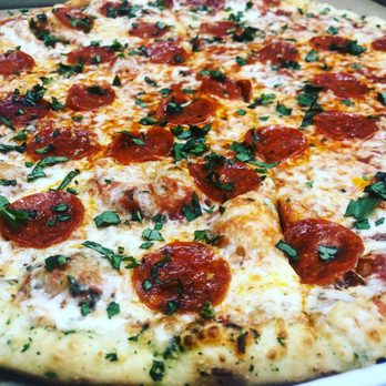 Pizza Casbah - The Brooklyn Pie: Pepperoni, Minced Garlic, Fresh chopped basil. - Pizza Near Me - Fort Collins, Colorado Pizza Casbah - The Brooklyn Pie: Pepperoni, Minced Garlic, Fresh chopped basil. - Pizza Near Me - Fort Collins, Colorado