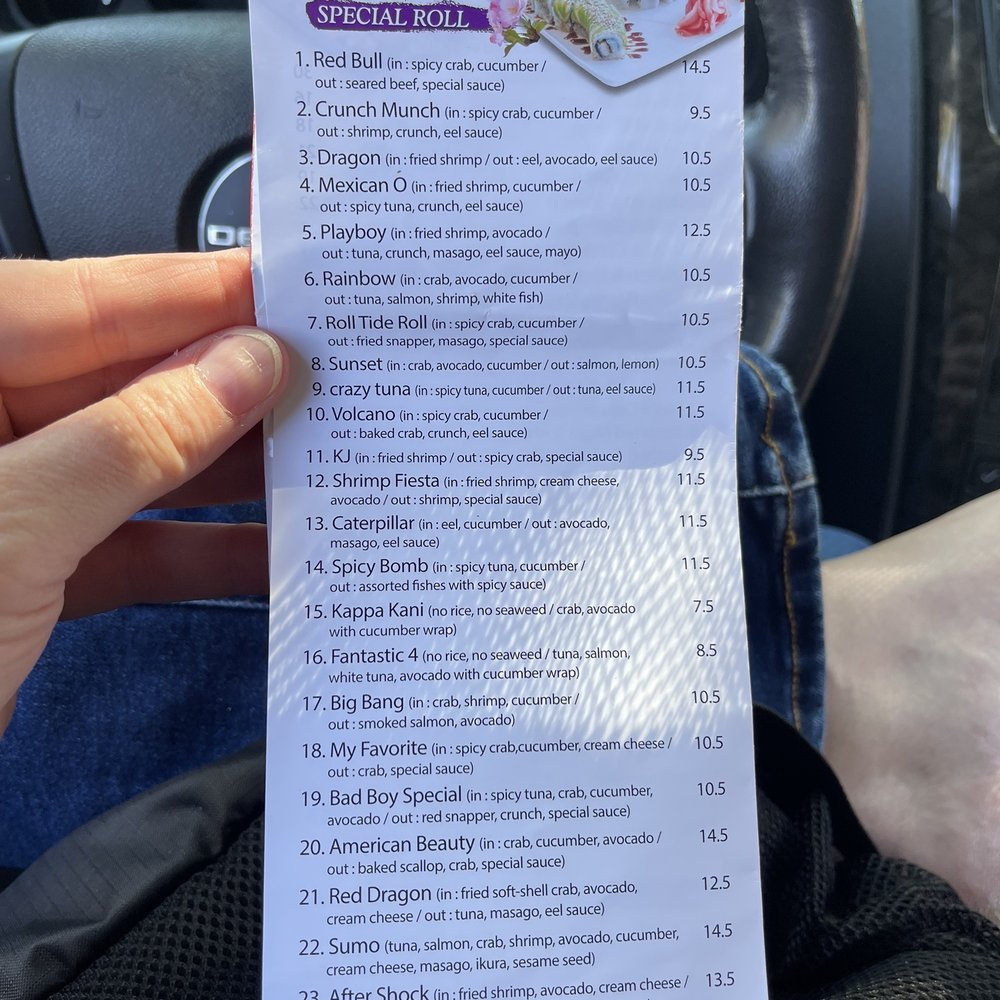 Sushi Fresh - a hand holding a menu in a car - Japanese Near Me - Pike Road, Alabama Sushi Fresh - a hand holding a menu in a car - Japanese Near Me - Pike Road, Alabama