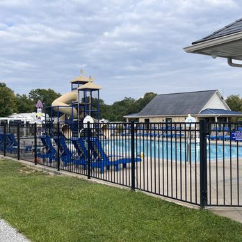 Whispering Hills RV Park - Pool at daytime with slides at far end and water basket goals on each side - Campgrounds Near Me - Georgetown, Kentucky Whispering Hills RV Park - Pool at daytime with slides at far end and water basket goals on each side - Campgrounds Near Me - Georgetown, Kentucky