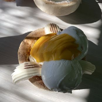 Coco Bomb - coconut sundae with mango and coconut ice cream -- so yummy - Cafes Near Me - San Diego, California
