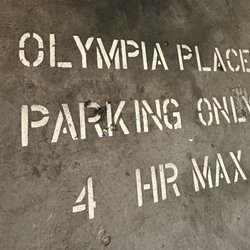 Olympia Place Customer Parking - Upper floors had this type of language painted into spots. There were no mobile pay stations here.