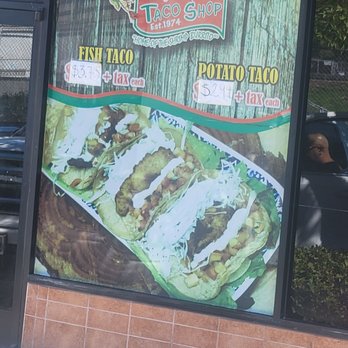 Cotija's Taco Shop - The sign showing soft shell potatoe ta o looks diffrent wouldn't u say went in the trash - Mexican Near Me - San Diego, California
