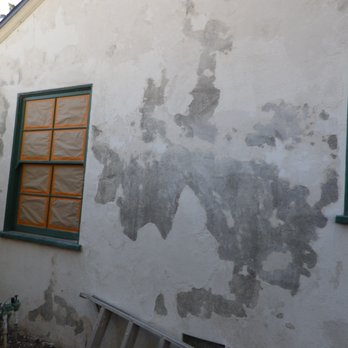 Elite Painting - Masking windows and stucco removal - Painters Near Me