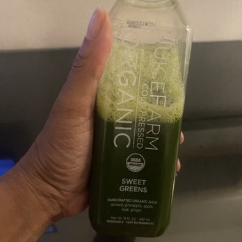 JuiceFarm - a person holding a bottle of juice - Acai Bowls Near Me - Las Vegas, Nevada JuiceFarm - a person holding a bottle of juice - Acai Bowls Near Me - Las Vegas, Nevada
