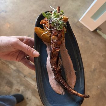 Atlantic Prime Coastal Kitchen - Confit Octopus Chargrilled on a bed of Romesco potato wedges (with almond flour- so gluten free!!)  and Kalamata olive aioli - Seafood Near Me - Franklinton, North Carolina
