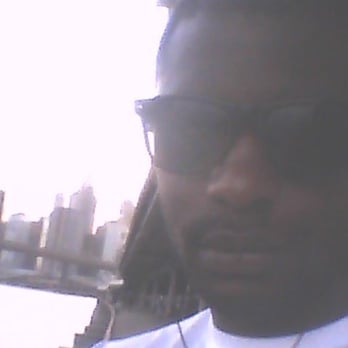 Napoli Pizza - a man wearing sunglasses and a white t - shirt - Pizza Near Me - Brooklyn, New York Napoli Pizza - a man wearing sunglasses and a white t - shirt - Pizza Near Me - Brooklyn, New York