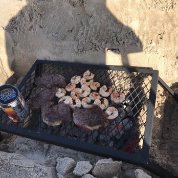 Captain Mark's Seafood - a grill with shrimp and shrimp on it - Seafood Near Me - Freeport, Texas Captain Mark's Seafood - a grill with shrimp and shrimp on it - Seafood Near Me - Freeport, Texas