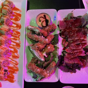 Rock N Roll Sushi - Sunset Strip Roll (left) Jalapeño Poppers (center) Twisted Tuna (right) - Sushi Bars Near Me - Apollo Beach, Florida Rock N Roll Sushi - Sunset Strip Roll (left) Jalapeño Poppers (center) Twisted Tuna (right) - Sushi Bars Near Me - Apollo Beach, Florida