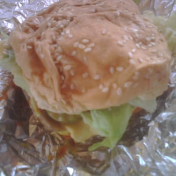 Five Guys - This is how squished the burger looks when unwrapped. It's a mess but a delicious mess. - Fast Food Near Me - San Jose, California Five Guys - This is how squished the burger looks when unwrapped. It's a mess but a delicious mess. - Fast Food Near Me - San Jose, California