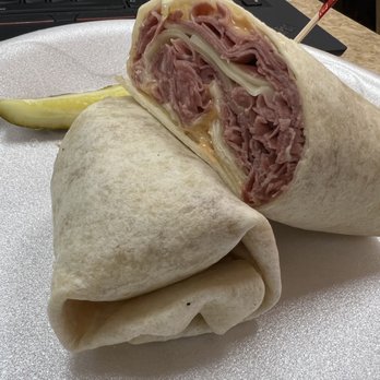 Staceys Deli & Catering - #9 Black Angus Corned Beef Reuben Hot Sandwich in a wrap - Delis Near Me - Charlotte, North Carolina Staceys Deli & Catering - #9 Black Angus Corned Beef Reuben Hot Sandwich in a wrap - Delis Near Me - Charlotte, North Carolina