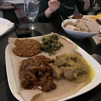 Awash Ethiopian Restaurant - Meat Sampler with the Special Tibs, Beg Alicha, Misir Wat, and Gomen - Ethiopian Near Me - New York, New York Awash Ethiopian Restaurant - Meat Sampler with the Special Tibs, Beg Alicha, Misir Wat, and Gomen - Ethiopian Near Me - New York, New York
