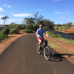 Riding the boardwalk just north of Kealia Beach.