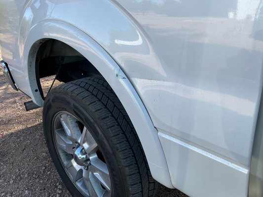 Parking lot damage - Just another customer that came out to his truck to find someone had hit it while he was in the store
