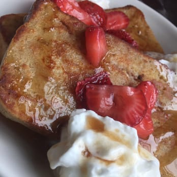 HangOverEasy - Bread Pudding French Toast with maple syrup, whipped cream and strawberries - Breakfast & Brunch Near Me - Cincinnati, Ohio
