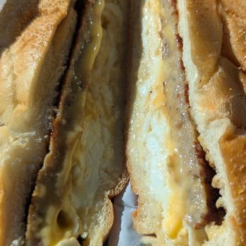 Hilton's - Inside of the turkey sausage, egg, white and cheese sandwich. - Breakfast & Brunch Near Me - Hempstead, New York