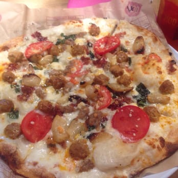 MOD Pizza - How I MOD: garlic cream sauce with basil, tomatoes, Italian sausage, bacon, chopped garlic, roasted garlic, and lots of CHEESE! - Pizza Near Me - Santa Clara, California