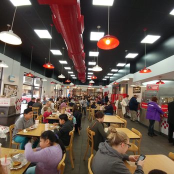 Five Guys - diners in a fast food restaurant - Burgers Near Me - Huntsville, Alabama Five Guys - diners in a fast food restaurant - Burgers Near Me - Huntsville, Alabama