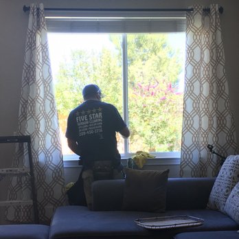 Five Star Window & Gutter Cleaning - Rob doing his magic. - Window Washing Near Me - Modesto, California Five Star Window & Gutter Cleaning - Rob doing his magic. - Window Washing Near Me - Modesto, California