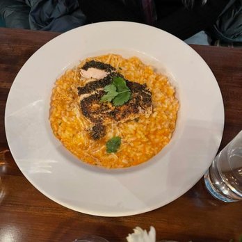 Amaro's Table - Roasted Red Bell Pepper Risotto w Blackened Breast of Chicken. Also very delicious. Risotto cooked perfectly and the chicken moist and tasty - New American Near Me - Vancouver, Washington