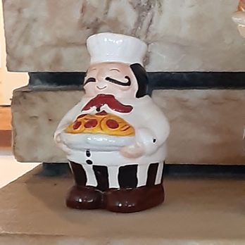 Pizza Time - a chef holding a slice of pizza - Pizza Near Me - Saratoga Springs, New York Pizza Time - a chef holding a slice of pizza - Pizza Near Me - Saratoga Springs, New York