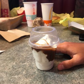 McDonald's - a hand holding a cup of coffee - Fast Food Near Me - Salem, Wisconsin