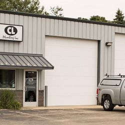 CL Plumbing - Our building and a work truck.