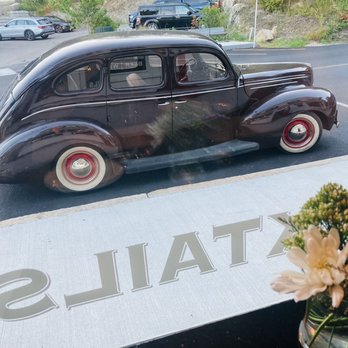 Copita - an old car parked in a parking lot - New American Near Me - Mount Desert, Maine