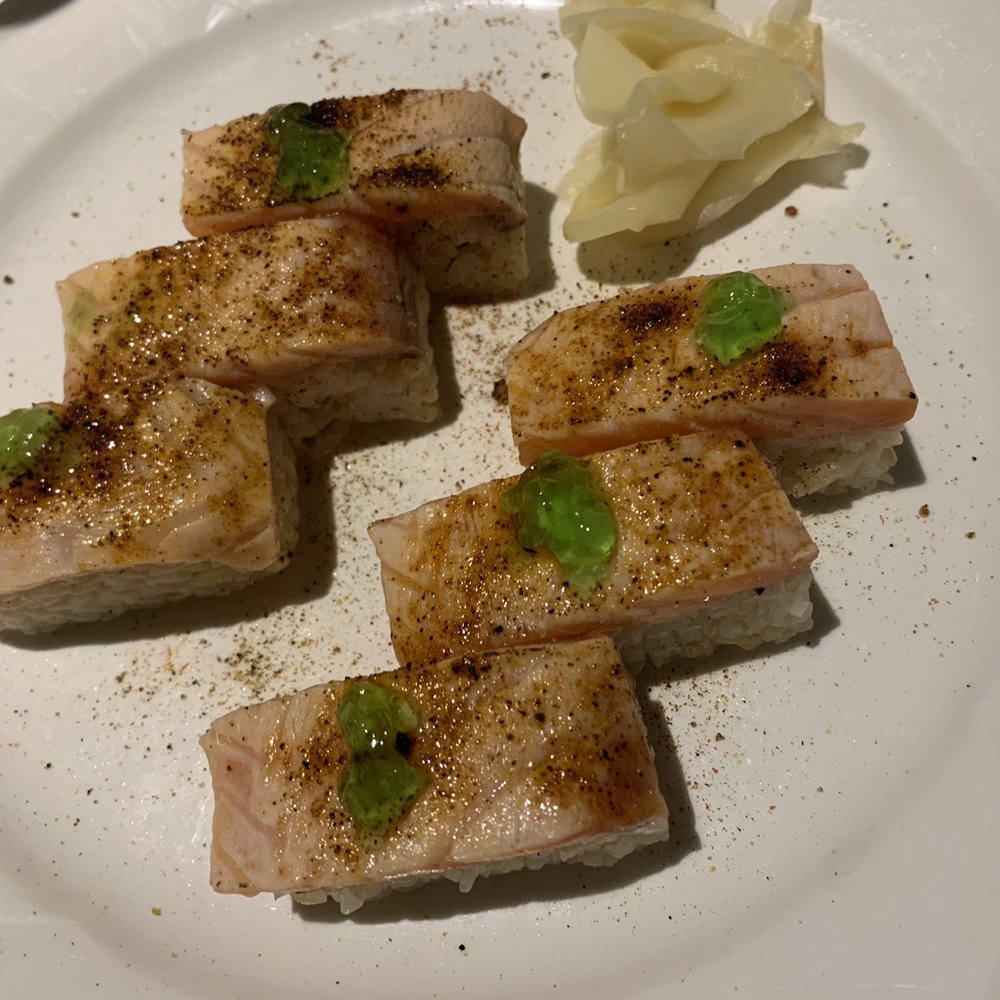 Haraheri - Cajun Salmon Oshi six pieces of block shaped, cajun salt seared salmon sushi with lemon pepper and lime jelly, topped with pea shoot. - Japanese Near Me - Vancouver, British Columbia Haraheri - Cajun Salmon Oshi six pieces of block shaped, cajun salt seared salmon sushi with lemon pepper and lime jelly, topped with pea shoot. - Japanese Near Me - Vancouver, British Columbia