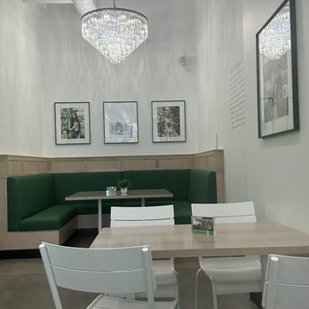 Crisp & Green - a dining area with a chandelier - Salad Near Me - Rockwall, Texas