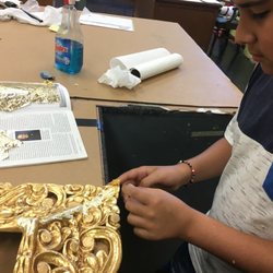 Benavides Picture Framing - Our son Agusto Benavides learning the Gold Leaf process.