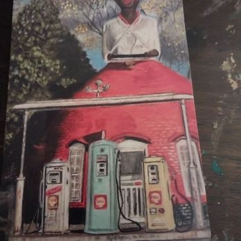 Mammy's Cupboard - a man sitting on top of a gas station - American Near Me - Natchez, Mississippi Mammy's Cupboard - a man sitting on top of a gas station - American Near Me - Natchez, Mississippi
